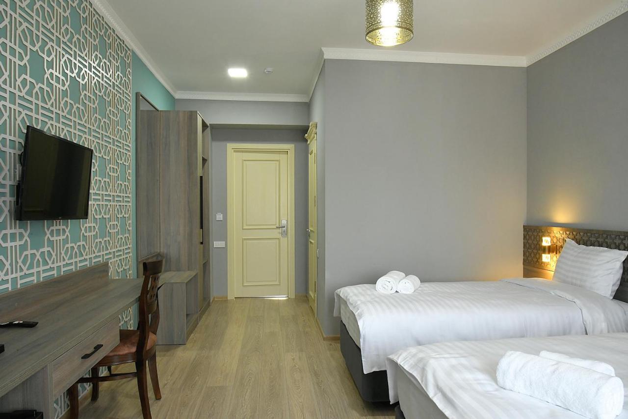 Khan Hotel Samarkand Esterno foto