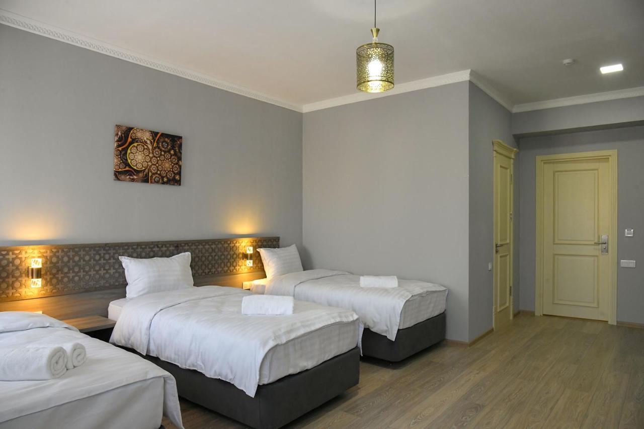 Khan Hotel Samarkand Esterno foto