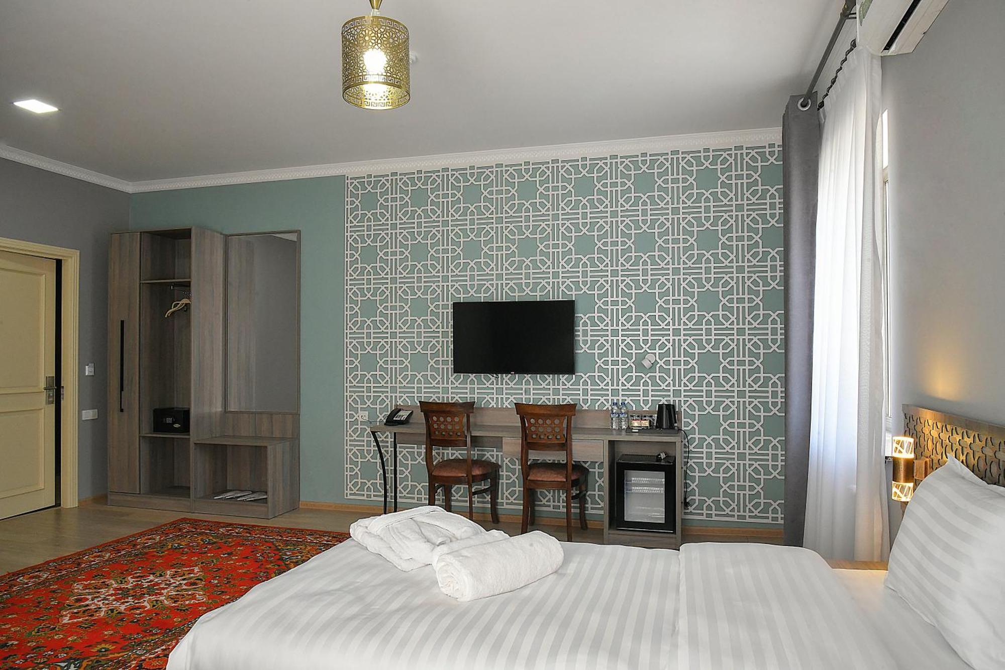 Khan Hotel Samarkand Esterno foto